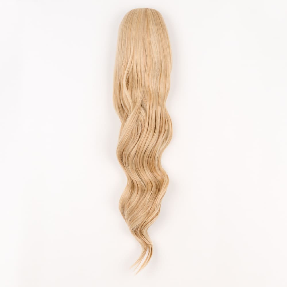 24 Inch Long Clip-in Ponytail Extension on a claw clip attachment in colour Strawberry Blonde