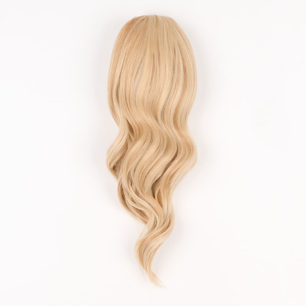 16 Inch Medium Length Clip-in Ponytail Extension on a claw clip attachment in colour Strawberry Blonde