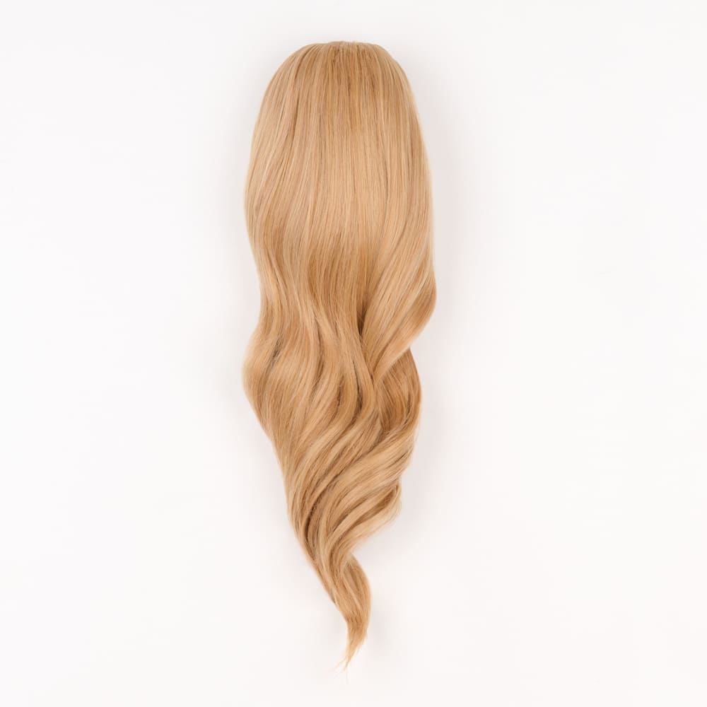 16 Inch Medium Length Clip-in Ponytail Extension on a claw clip attachment in colour Ginger