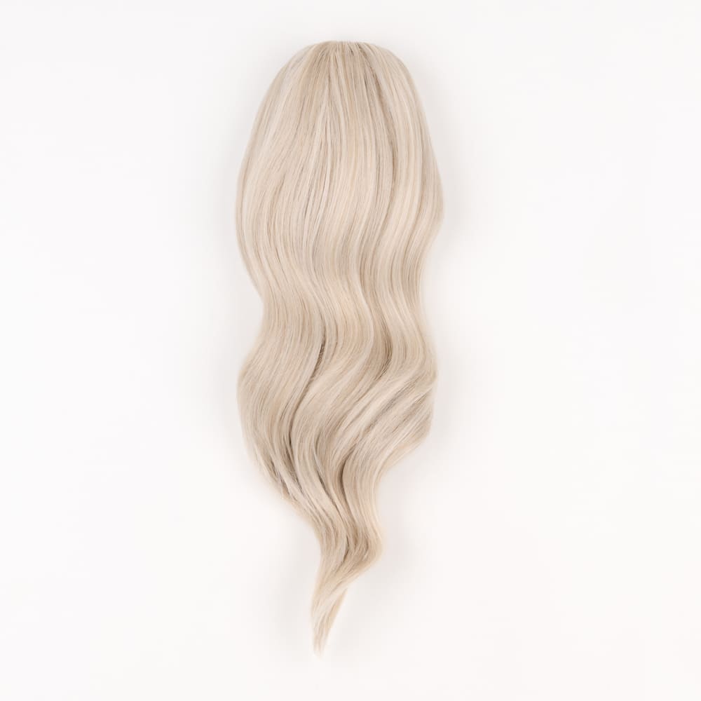 16 Inch Medium Length Clip-in Ponytail Extension on a claw clip attachment in colour Silver