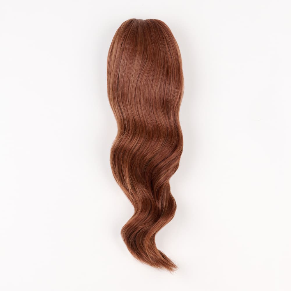 16 Inch Medium Length Clip-in Ponytail Extension on a claw clip attachment in colour Auburn