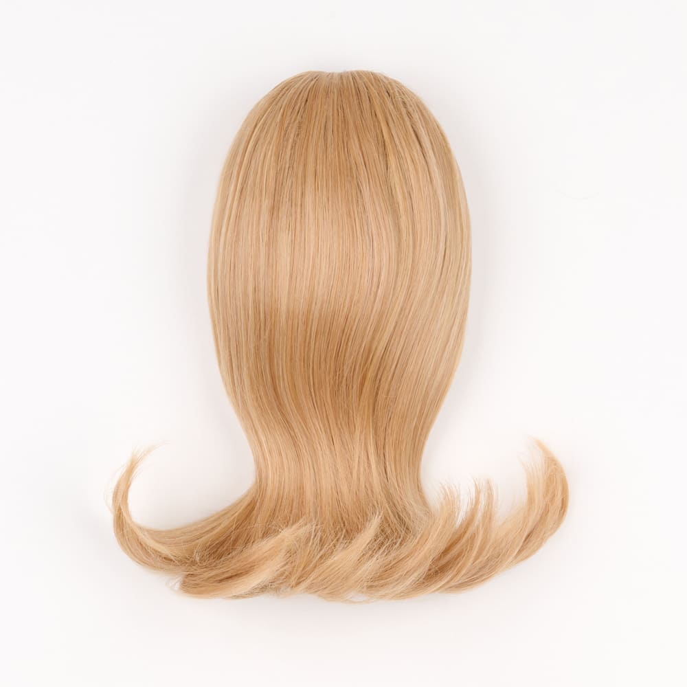 12 Inch Short Clip-in Ponytail Extension on a claw clip attachment in colour Ginger