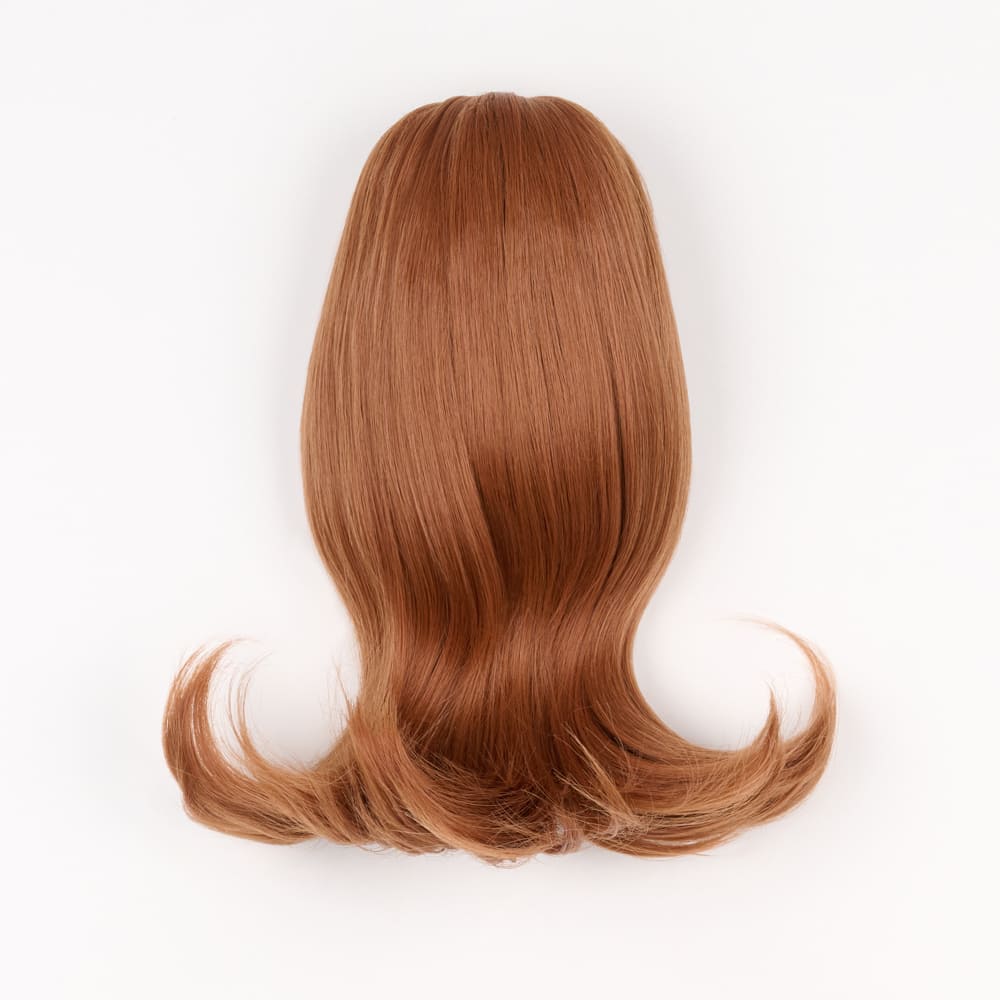 12 Inch Short Clip-in Ponytail Extension on a claw clip attachment in colour Copper
