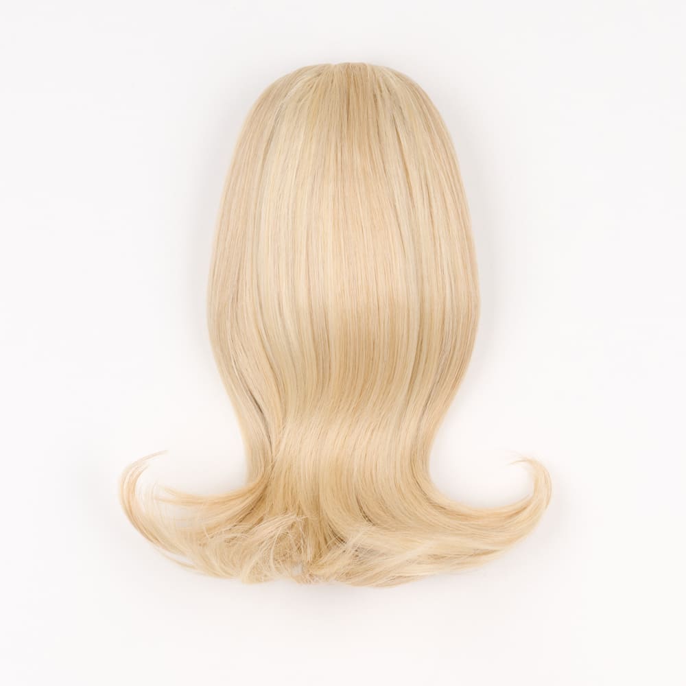12 Inch Short Clip-in Ponytail Extension on a claw clip attachment in colour UK Blonde