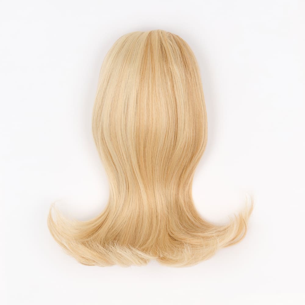 12 Inch Short Clip-in Ponytail Extension on a claw clip attachment in colour Strawberry Blonde