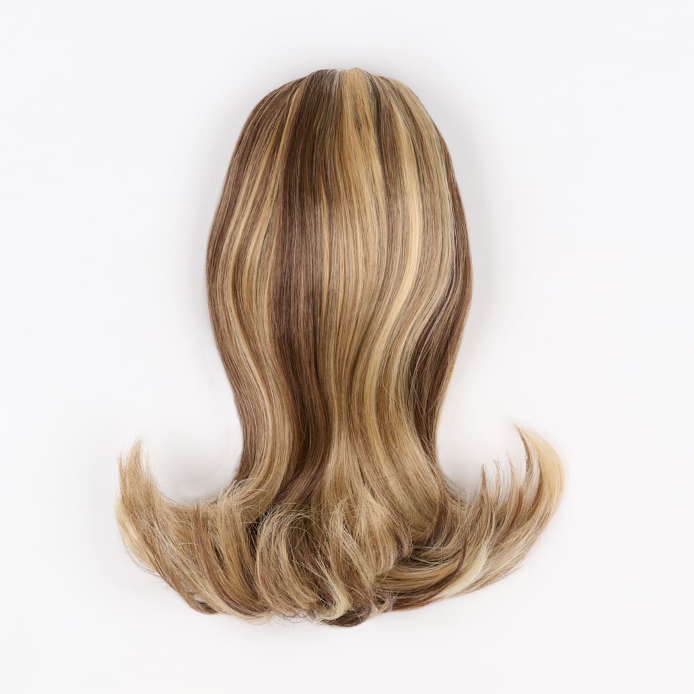 12 Inch Short Clip-in Ponytail Extension on a claw clip attachment in colour Mixed Blonde and Brunette